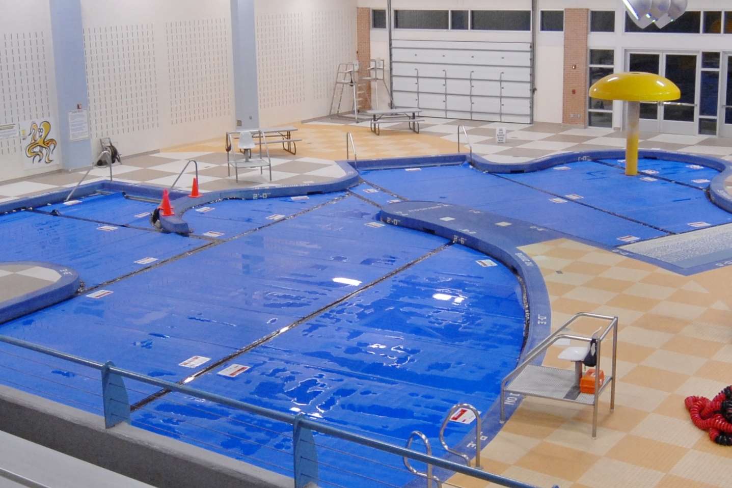 Thermal pool covers on a multi-section indoor pool